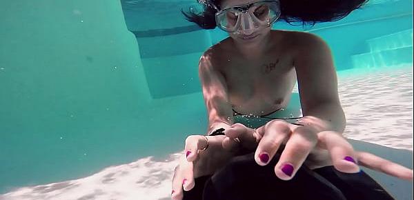  Brita Piskova masturbates underwater in the swimming pool
